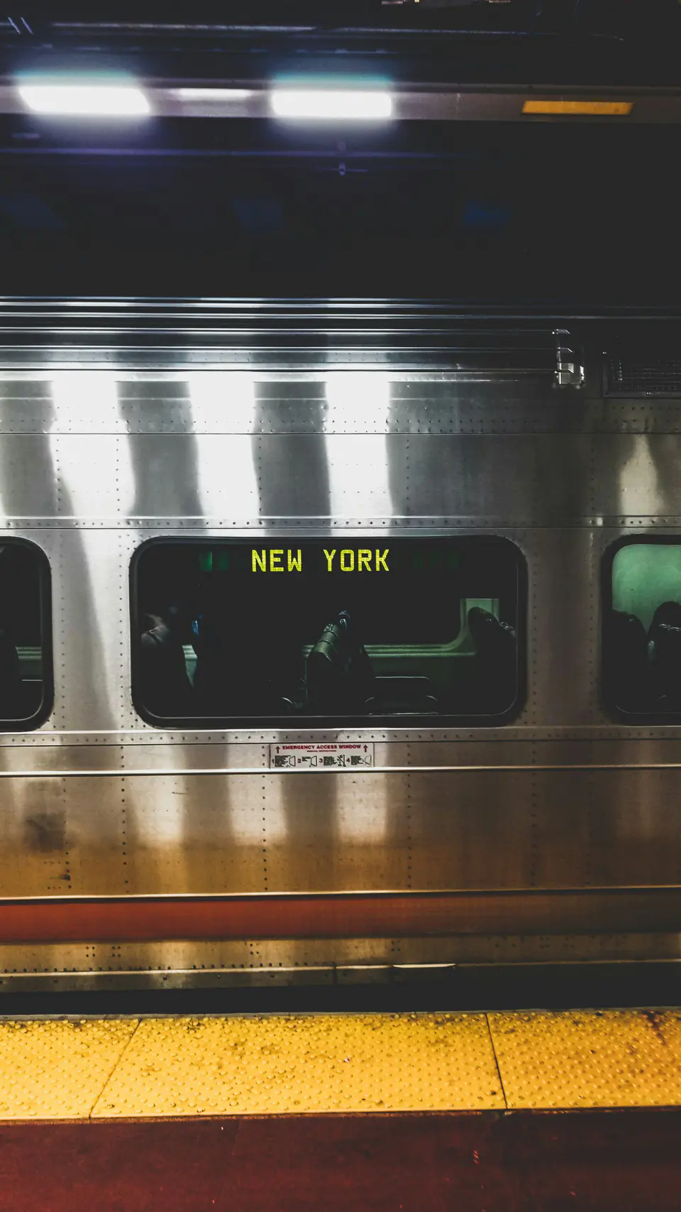 New York subway train waiting at the platform