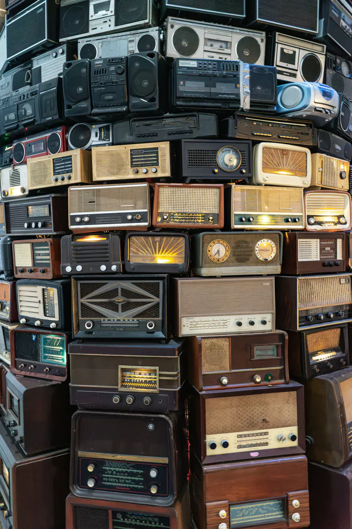 Stacked wall of vintage radios
